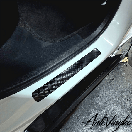 Custom vinyl door sills for 2023+ Honda Accord, featuring a sleek carbon fiber design that enhances vehicle style.