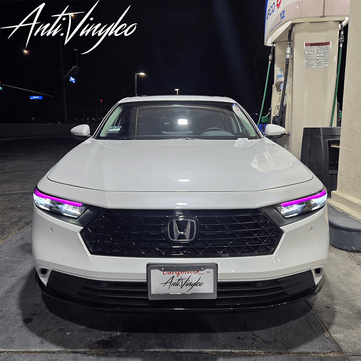 2023 Honda Accord at night showcasing sleek headlight DRL tints with stylish purple accents.